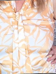 The sweet pussy lips of a mature tart are spread wide